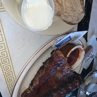  plate of ribs and a side of bread