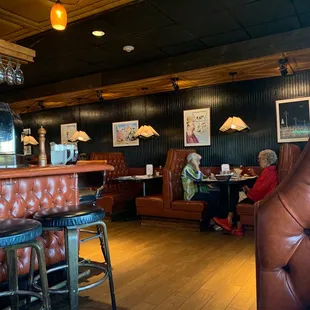  woman sitting at a bar