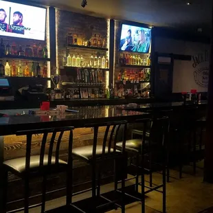 a bar with bar stools