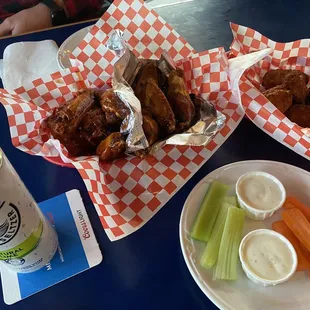 Saki teriyaki and sweet bbq wings. Jalapeño poppers!