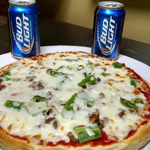 a pizza and two cans of bud