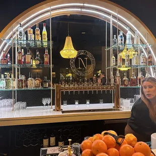 a woman sitting at a bar