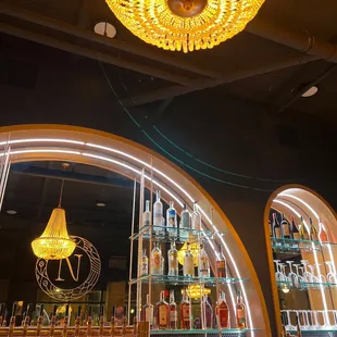 a chandelier and bar