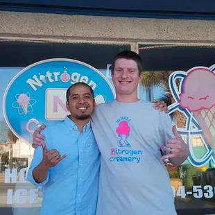 two men posing for a picture