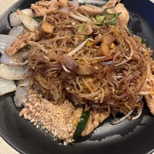 Pad Thai Chicken spice 5. Added white onions.