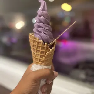 Ube on a waffle cone with mochi at the bottom!