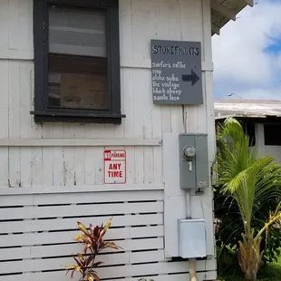 When you park in the back, look for this sign to get to the store front