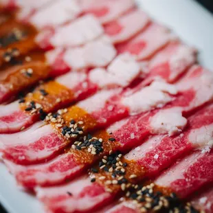 a platter of sliced meat