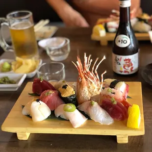 Omakase was bluefin tuna 2 pc., toro w/ gold flake, black snapper, yellowtail belly, uni, sweet shrimp, sea scallop, octopus.