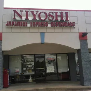 Entrance to the restaurant at far left side of Magic Mart plaza