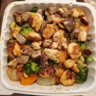 Chicken, steak, &amp; shrimp with veggies! Huge plates.