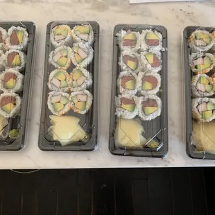 Two order of California rolls and two spicy tuna rolls