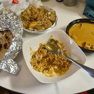 Garlic naan, vegetable biryani, Chicken Korma