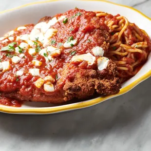 CHICKEN PARMIGIANA - pan fried organic chicken breast, mozzarella, san marzano tomatoes, pasta marinara