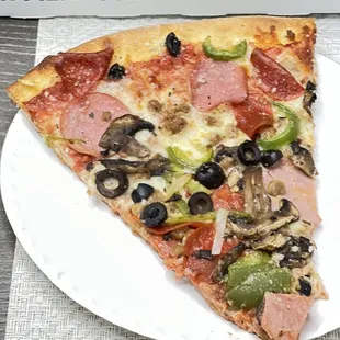 a slice of pizza on a plate