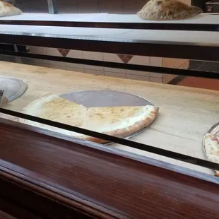 Pizza by the slice is available.