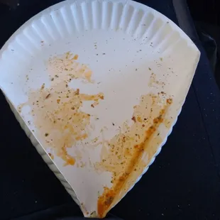 Pizza comes in a folded paper plate.