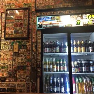 a display of beer bottles in a bar