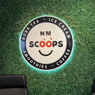 the logo on the wall