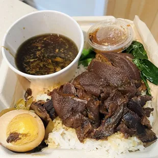 Khao Kaa Moo (Stewed Pork Leg Rice) - sweet and savory with mustard greens, Chinese broccoli and garlic vinegar sauce