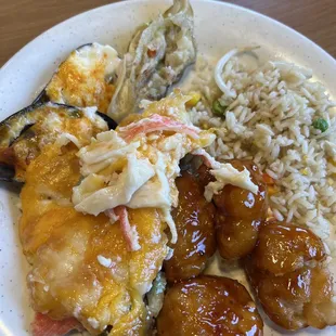 Orange chicken, fried rice, mussels, imitation crab casserole
