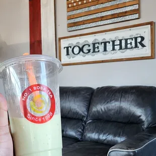 Avocado smoothie with boba.