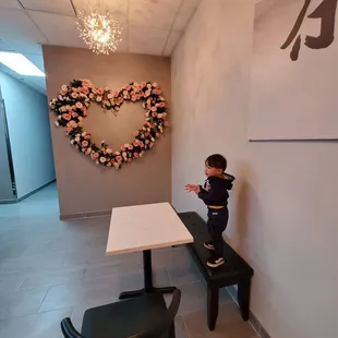 Seating area with the big heart on the wall