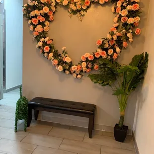 a heart shaped flower arrangement