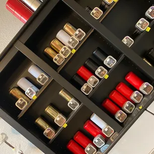 a shelf of various teas