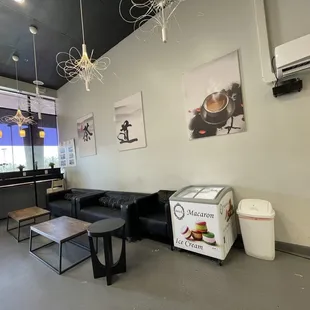 a black leather couch and coffee table