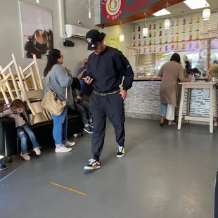 a line of people waiting in line