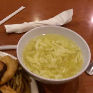 a bowl of noodles and a bowl of soup