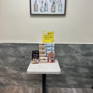 a table with a sign on it