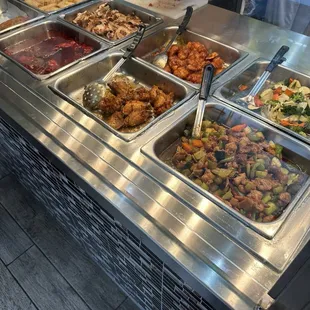 a buffet with many different types of food