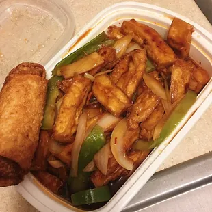 Szechuan Style tofu. When you ask for a vegetable egg roll, they give you one! Not a spring roll like other places do!