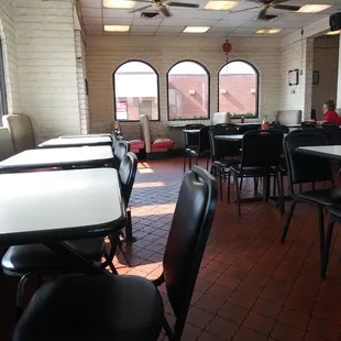 Tables and chairs, windows and ceiling fans