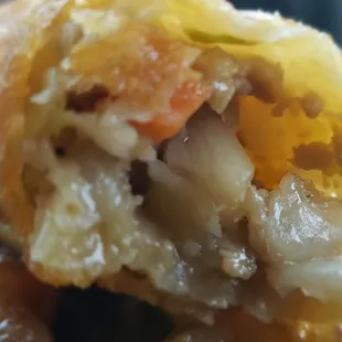 Inside the egg roll.