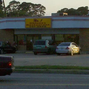 cars parked in front of the restaurant