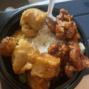 General Tso chicken, Tofu and sweet &amp; sour pork without the sauce over rice.