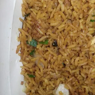 The fried rice here comes with a bonus of free flies my friend found this in here fried rice today