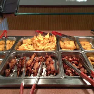 a buffet with a variety of food items