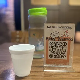  a plastic cup with a qr code on it