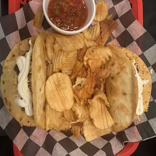 Pulled pork tacos with Pico de gallo and seasoned chips