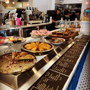 donuts and pastries on a counter