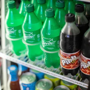 a refrigerator full of sodas