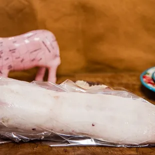 a pork wrapped in plastic