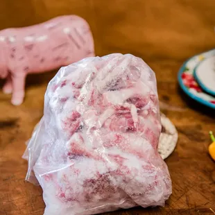 a pork wrapped in plastic