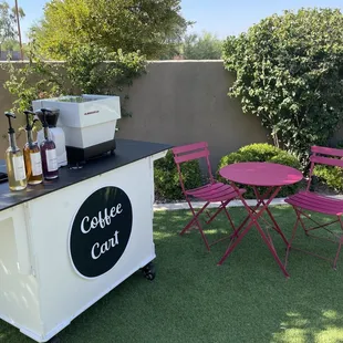 a table and chairs outside