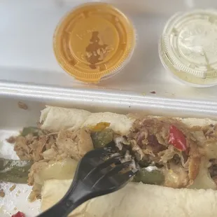 PREMIUM CHICKEN PHILLY with sauces on the side (cheese sauce and garlic aioli)