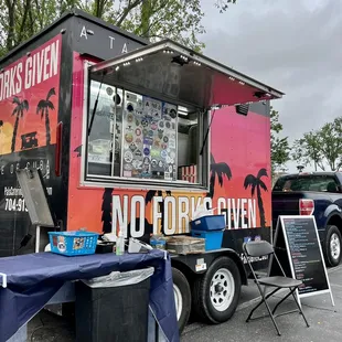 a food truck parked in a parking lot